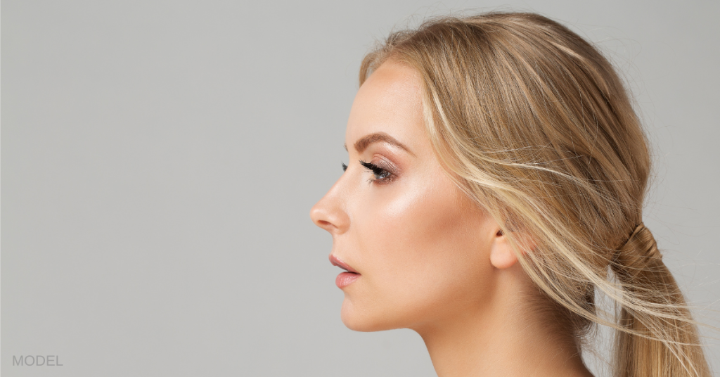 Woman showing side face profile (model)