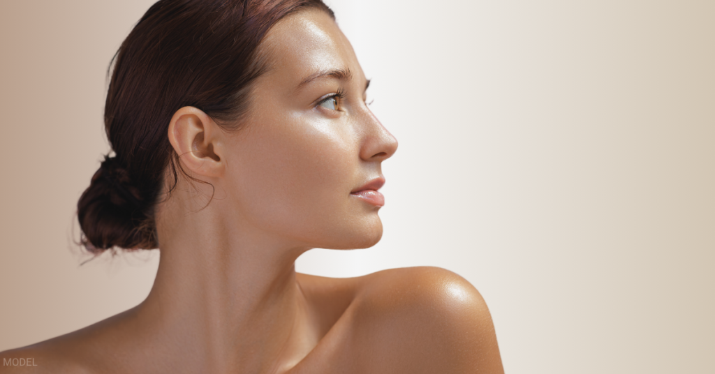 Woman shown in profile highlighting the nose, relevant to liquid rhinoplasty vs. traditional rhinoplasty (model)